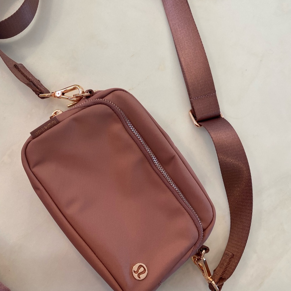 Lululemon Mauve Crossbody Bag with Rose Gold Hardware